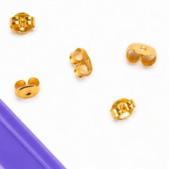 Five spare gold Butterfly Backs